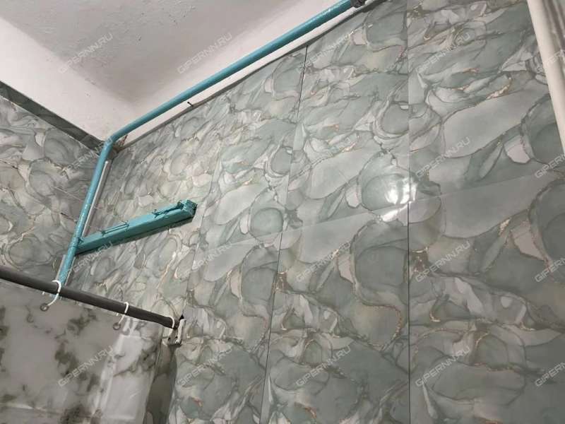 комната в доме 13 на улице Героя Советского Союза Поющева